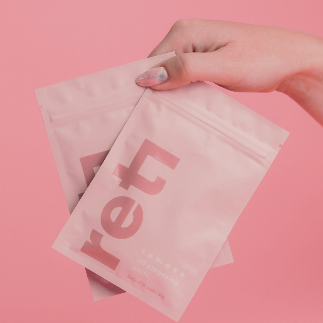 cleansing oil and chemical peel pads in pink sachets